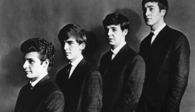 in-the-wings-with-sam-deas-a-theatre-rooted-portrait-and-the-family-behind-him